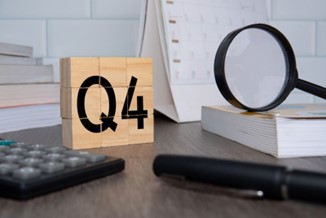 blocks reading Q4 on office background